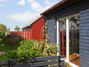 Гостиница Roter Bungalow am Strand _50m_ _ O  Am Salzhaff